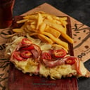 Foto de MILANESA PANCETA CEBOLLA Y TOMATES CHERRY DE CARNE O POLLO