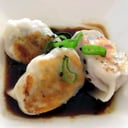 Foto de Gyozas de cerdo y nira