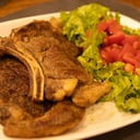 Foto de Bife de costilla c Guarniciòn