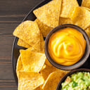 Foto de Nachos con queso (guacamole o pico de gallo)