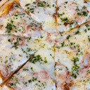 Foto de Muzza con albahaca