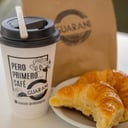 Foto de Cafe con leche + 2 medialunas 