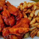 Foto de Alitas BBQ Familiar