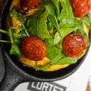 Foto de PROVOLETA CON ROMESCO, CHERRY CONFITADO Y RÚCULA