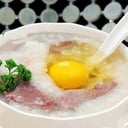 Foto de (034)窝蛋牛肉粥