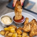 Foto de Fingers de pollo con papas horneadas