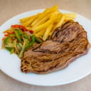 Foto de Churrasco con Guarnicion (aclarar guarnicion en comentarios)