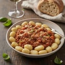 Foto de Ñoquis tradicional con salsa boloñesa