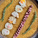 Foto de ARROZ DE PRESA BELLOTA BEHER AL ROMERO Y HUEVOS FRITOS