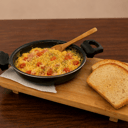 Foto de Huevos con tomate y orégano
