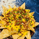 Foto de NACHOS CHEDDAR TOCINO