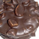 Foto de ALFAJOR DE CHOCOLATE BAÑADO CON MANI