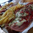 Foto de MILANESA A LA NAPOLITANA CON GUARNICION