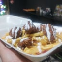 Foto de BONELESS SOBRE PAPAS CRUJIENTES 