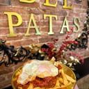 Foto de Pisto Patas con secreto ibérico patatas y huevo frito 
