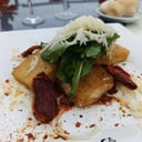 Foto de Milanesa de muzzarella con rúcula
