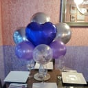 Foto de Decoracion boutique de 8 globos con feston de cumpleaños