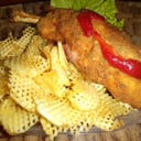 Foto de Suprema rellena con papas rejillas