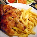Foto de Pollo a las brasas c/ fritas o ensalada