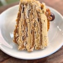 Foto de Porción Torta Hojarasca Lucuma Manjar