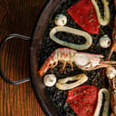 Foto de PAELLA NEGRA (precio por persona)