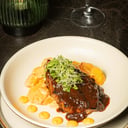 Foto de CERDO EN SALSA DE CIRUELA