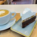 Foto de Promoción: Café + porción de torta 