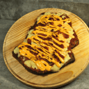 Foto de Pizzanesa de cheddar y panceta ahumada.