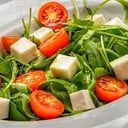 Foto de Ensalada de rucula, cherry y parmesano