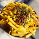 Foto de PAPAS CHEDDAR TOCINO