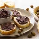 Foto de Crostini con Paté d’Olive.