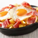 Foto de Huevos Rotos con Patatas y Jamón Ibérico