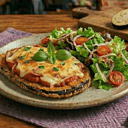 Foto de 2 Milanesas de Berenjena Napolitana c/guarnición