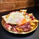 Foto de Huevos rotos con Jamón Ibérico