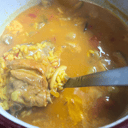 Foto de Arroz caldoso de costilla adobada de cerdo duroc, setas del monte y arroz de la Albufera Valenciana con D.O