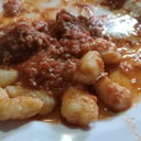 Foto de Ñoquis de papas con boloñesa