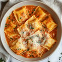 Foto de Ravioles con salsa bolognesa