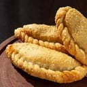 Foto de Criollas (Saladas / Dulces / Mondongo) por docena