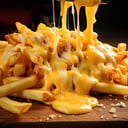 Foto de Papas fritas con cheddar
