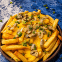 Foto de PAPAS CHEDDAR CHAMPIÑON