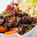 Foto de ceviche de conchas negras