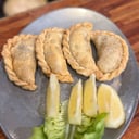 Foto de • EMPANADA DE CARNE CORTADA A CUCHILLO