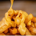 Foto de PORCION DE PAPAS CON CHEDDAR