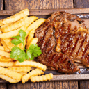 Foto de Bondiola de cerdo a la parrilla con guarnición a elección