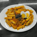 Foto de 1/2 PORCION TOPOKI (떡볶이)(PICANTE)🌶️🌶️🌶️🌶️