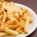 Foto de Papas con salsa cheddar 