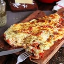Foto de Matambre de cerdo a la pizza con guarnición