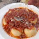 Foto de Sorrentinos de muzzarella y jamón con boloñesa (al disco)