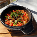 Foto de Provoleta primavera al horno de barro