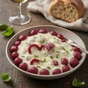 Foto de Ñoquis de remolacha relleno con queso con salsa blanca